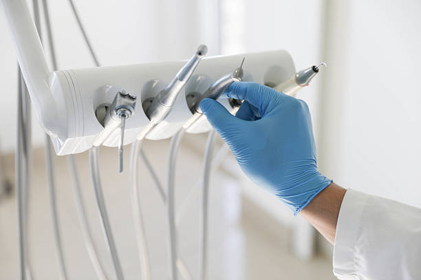 Professional Tooth Extraction technician working in Greenville, VA